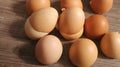 Stacked Empty Brown Eggshells on Rustic Wooden Background Royalty Free Stock Photo