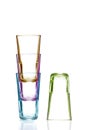 Stacked empty colorful glasses