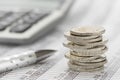 Stacked euro coins on table sheet Royalty Free Stock Photo