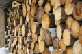 Stacked firewood outdoors, closeup. Heating house in winter