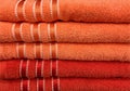 Stacked Fluffy Orange Towels with Stripes Royalty Free Stock Photo