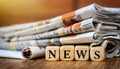 Newspapers and the Word NEWS in Wooden Block Puzzle Dice - Generative Ai