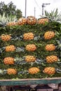 Stacked Fresh Pineapples on Display in a Vibrant Market Setting Royalty Free Stock Photo