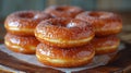 Stacked glazed donuts, a delicious baked goods treat Royalty Free Stock Photo