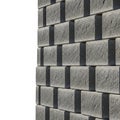 Stacked Gray Interlocking Retaining Wall Blocks with Textured Surface building material Royalty Free Stock Photo