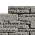 Stacked Gray Stone Bricks with Rough Texture on a White Background masonry wall Royalty Free Stock Photo