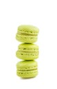 Stacked green cake macaron on white background, maccarone sweet dessert