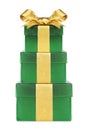 Stacked green gift boxes wrapped with gold bow and ribbon isolated on white Royalty Free Stock Photo