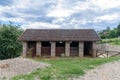 Stacked hay in agricultural stall at farmhouse Royalty Free Stock Photo