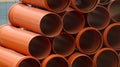 Stacked hdpe sewage pipes on construction site Royalty Free Stock Photo