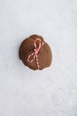 Stacked heart shaped cookies wrapped with red and white twine