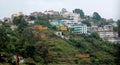 Stacked houses built and trees on the kodaikanal tour place. Royalty Free Stock Photo