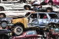 Indianapolis - Circa September 2017: Stacked junk yard clunker cars prepared for crushing to be recycled XI Royalty Free Stock Photo