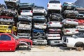 Indianapolis - Circa September 2017: Stacked junk yard clunker cars prepared for crushing to be recycled XIII Royalty Free Stock Photo