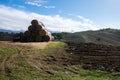 Stacked like a pyramid, bales of straw, tightened mesh. Royalty Free Stock Photo