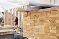 Stacked Lumber and Blueprints at a Construction Si Royalty Free Stock Photo