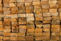 Stacked lumber pile, close-up of cut wood logs for timber industry. Forestry texture background, sawn wooden beams in Royalty Free Stock Photo