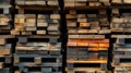 Stacked lumber in various colors and sizes