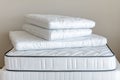 Stacked Mattresses in a Store showcasing different styles and designs The mattresses are new and offer a comfortable sleep Royalty Free Stock Photo