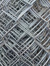 Stacked metal wire fence rolls