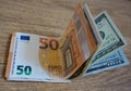 Stacked money: dollars and euros. Royalty Free Stock Photo