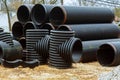 Stacked new PVC pipe on construction of housing project