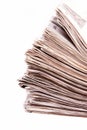 Stacked newspapers