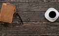 Stacked old books, eyewear and cup of coffee Royalty Free Stock Photo