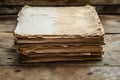 Stacked old papers resting on a wooden surface Royalty Free Stock Photo