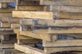 Stacked old untreated used timber