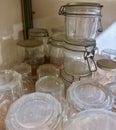 Stacked and Organized Empty Glass Jars with Clasps in a Pantry for Storage