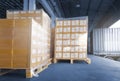 Stacked of Package Boxes Load into Cargo Container. Truck Parked Loading at Dock Warehouse. Delivery Service. Warehouse Logistics Royalty Free Stock Photo