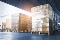 Stacked of Package Boxes Loading into Container Truck. Truck Parked Loading at Dock Warehouse. Delivery Service. Royalty Free Stock Photo