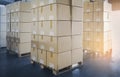 Stacked of Package Boxes on Wooden Pallet at Storage Warehouse. Shipment Boxes. Cargo Export- Import. Royalty Free Stock Photo