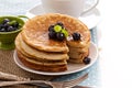 Stacked pancakes with berries