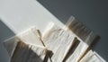 Stacked Parchment Paper with Dramatic Sunlight Shadows Royalty Free Stock Photo