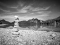 Stacked pebbles on the lake shore. Balanced stones stack Royalty Free Stock Photo