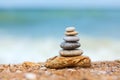 Stacked pebbles on the sea side