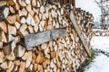 Stacked pile of firewood at winter time Royalty Free Stock Photo