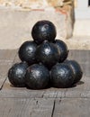 Stacked pile of old cannonballs