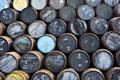 Stacked pile of old wooden barrels and casks at whisky distiller Royalty Free Stock Photo