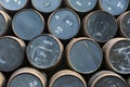 Stacked pile of old wooden barrels and casks at whisky distiller Royalty Free Stock Photo