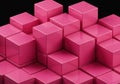 Stacked pink cubes create a geometric pattern against a dark background. Royalty Free Stock Photo
