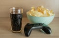 Stacked Potato Chips, Game Controller, and Soda â Leisure Time Concept Royalty Free Stock Photo