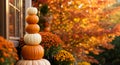 Stacked Pumpkins and Chrysanthemums in Autumn Setting Royalty Free Stock Photo