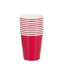 Stacked red plastic glasses cut out isolated white background with clipping path Royalty Free Stock Photo
