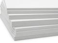 Stacked sheets of pristine white paper Royalty Free Stock Photo