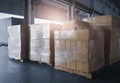 Stacked of shipment boxes on pallets waiting for load into container truck Royalty Free Stock Photo