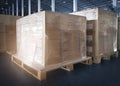 Stacked of shipment boxes wrapping palstic on pallet in warehouse storage. Cargo export & Shipping warehouse Royalty Free Stock Photo