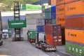 Stacked shipping containers in logistics site for import export from China to Europe